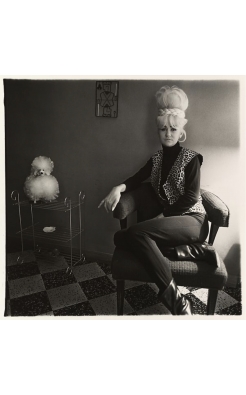 Diane Arbus, Lady Bartender at Home with a Souvenir Dog, New Orleans