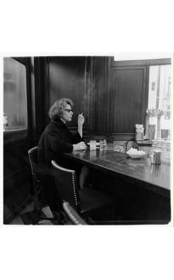 Diane Arbus, Woman at a counter smoking, N.Y.C., 1962