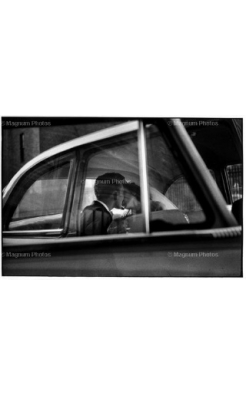 Elliott Erwitt, New York, Couple Kissing in Back of Car