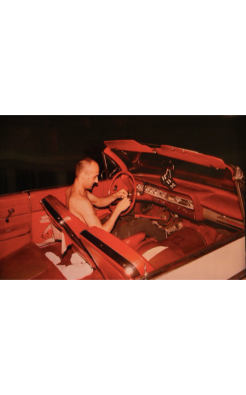 Nan Goldin, Bruce in his red car, NYC, 1981