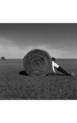 Rodney Smith, Man Leaning Against Hay Bale, Alberta, Canada, 2004