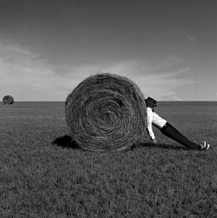 Rodney Smith, Man Leaning Against Hay Bale, Alberta, Canada, 2004