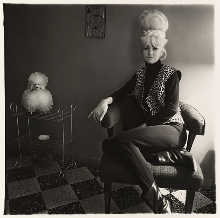 Diane Arbus, Lady Bartender at Home with a Souvenir Dog, New Orleans