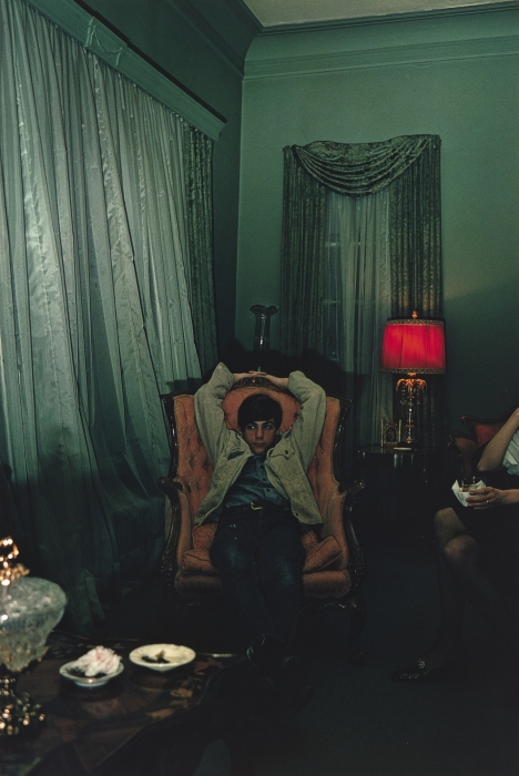 William Eggleston, Sumner, Mississippi (young man in chair), 1972