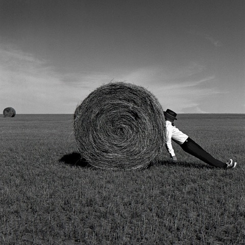 Rodney Smith, Man Leaning Against Hay Bale, Alberta, Canada, 2004 Rodney Smith, Man Leaning Against Hay Bale, Alberta, Canada, 2004